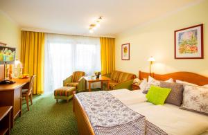 Postel nebo postele na pokoji v ubytování Hotel Konradshof