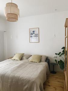 Ein Bett oder Betten in einem Zimmer der Unterkunft powiew - b&b pensjonat noclegi Świnoujście - Unterkunft Swinemünde - guesthouse tennis garden breakfast at baltic sea