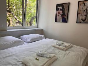 Posteľ alebo postele v izbe v ubytovaní SKAU Gajova Family Two Bedroom Apartment with a Terrace Free Parking