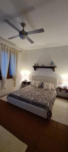 Cama ou camas em um quarto em Casa La Pelosa