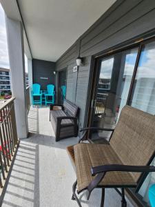 a balcony with chairs and a table and chairs at Myrtle Beach Resort- Unit A 428 in Myrtle Beach
