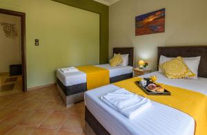 Posteľ alebo postele v izbe v ubytovaní Olive tree Apartment