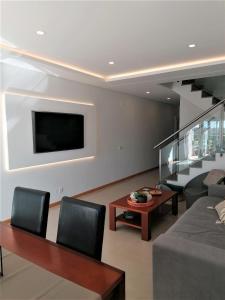 TV a/nebo společenská místnost v ubytování Condominium VEVITA