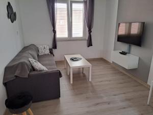 TV a/nebo společenská místnost v ubytování Apartman Alberta