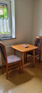 Posezení v ubytování Ferienwohnung Vido - Nordhalben