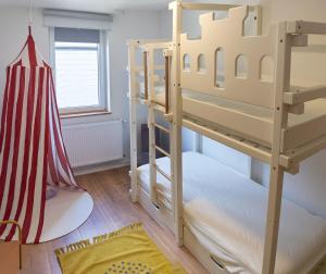 Postel nebo postele na pokoji v ubytování Familienglück Lautenthal