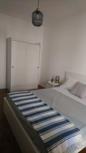 Postel nebo postele na pokoji v ubytování Loft 407