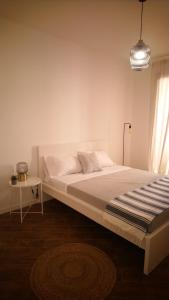 Postel nebo postele na pokoji v ubytování Loft 407