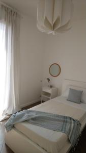 Postel nebo postele na pokoji v ubytování Loft 407