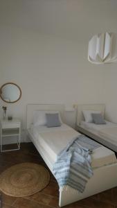 Postel nebo postele na pokoji v ubytování Loft 407