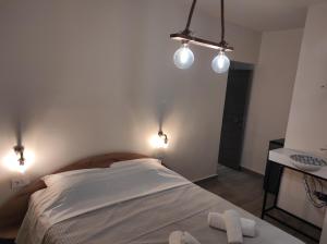Łóżko lub łóżka w pokoju w obiekcie Casa la Scala