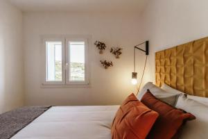 Postel nebo postele na pokoji v ubytování Casa do Baloiço