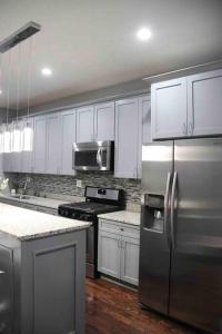 Kuchyň nebo kuchyňský kout v ubytování Upscale apartment Westside of Chicago