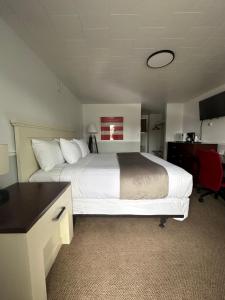 Letto o letti in una camera di Fossil Butte Motel