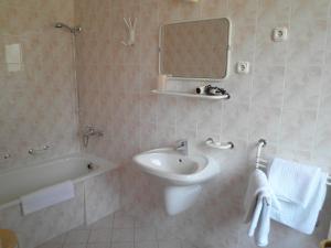 Kúpeľňa v ubytovaní Gründner Vendégház
