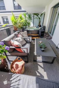 Posedenie v ubytovaní Zemplén Terrace - luxusapartman a belvárosban kültéri fedett jacuzzival