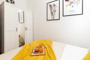 A bed or beds in a room at Cesare Apartment, with Swimming pool and Sea view