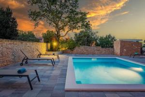 The swimming pool at or close to Cesare Apartment, with Swimming pool and Sea view