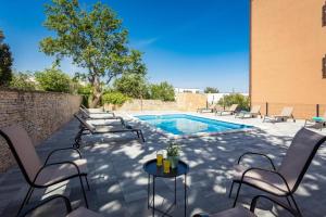 The swimming pool at or close to Cesare Apartment, with Swimming pool and Sea view