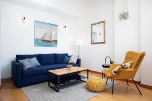 A seating area at Cesare Apartment, with Swimming pool and Sea view