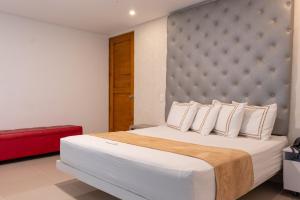 Voodi või voodid majutusasutuse Infinity Hotel toas