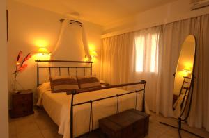 Postel nebo postele na pokoji v ubytování Summer Time - Tinos Apartments