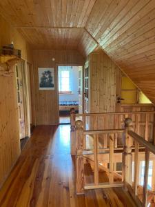 Televízia a/alebo spoločenská miestnosť v ubytovaní Gunia Gesthouse