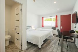 Postel nebo postele na pokoji v ubytování Motel Champlain