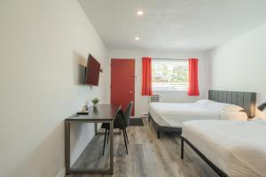Postel nebo postele na pokoji v ubytování Motel Champlain