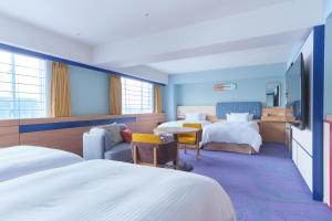 Postel nebo postele na pokoji v ubytování Miyako Hotel Kyoto Hachijo