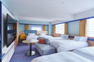 Postel nebo postele na pokoji v ubytování Miyako Hotel Kyoto Hachijo + 37 fotografií