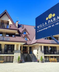 a building with a sign that reads willka park at Willa Paradna in Zakopane
