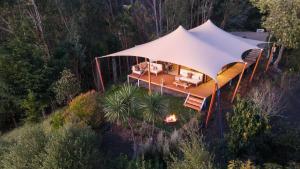 an overhead view of a tent in a garden at The Enchanted Retreat - Unforgettable Luxury Glamping in Havelock North