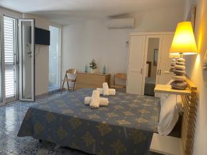 Postel nebo postele na pokoji v ubytování Vic e Vicariell + 13 fotografií