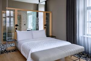 Posteľ alebo postele v izbe v ubytovaní Le Méridien Vienna