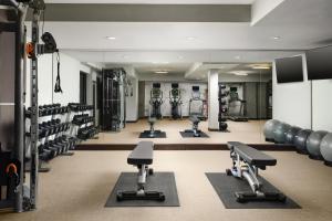 a fitness room with treadmills and weights at SpringHill Suites by Marriott Milpitas Silicon Valley in Milpitas