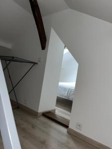 Łóżko lub łóżka w pokoju w obiekcie Appartement Centre-ville