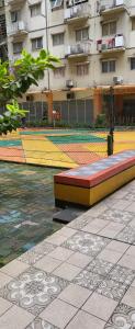 a colorful tennis court in front of a building at Icon gading in Jakarta