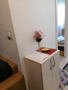 Postel nebo postele na pokoji v ubytování Apartman Centar 2