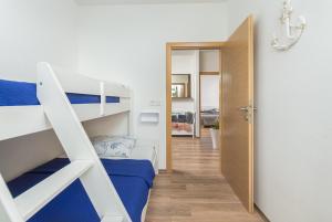 Postel nebo postele na pokoji v ubytování Kuća Lana