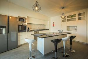 Kuchyň nebo kuchyňský kout v ubytování Joana & Marco - Guest House - 4 Caminhos