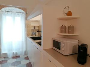 Kuchyň nebo kuchyňský kout v ubytování Diaz 22 Casa Vacanza + 10 fotografií