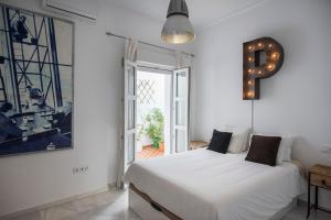 Posteľ alebo postele v izbe v ubytovaní La Casa de Lucía