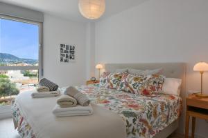 Posteľ alebo postele v izbe v ubytovaní Marina Real Apartments by NRAS