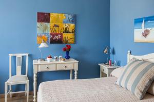A bed or beds in a room at Hotel San Pietro