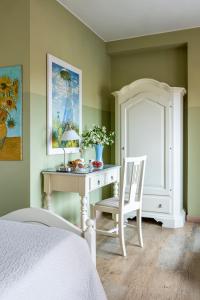 A bed or beds in a room at Hotel San Pietro