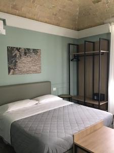 Posteľ alebo postele v izbe v ubytovaní VILLA ACTEA