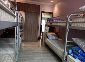 Voodi või voodid majutusasutuse Chase Dream Hostel追梦空间 toas