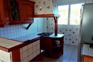 Η κουζίνα ή μικρή κουζίνα στο Appartement Motte Giron +5 φωτογραφίες