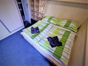 Postel nebo postele na pokoji v ubytování Vila Anna Wellness